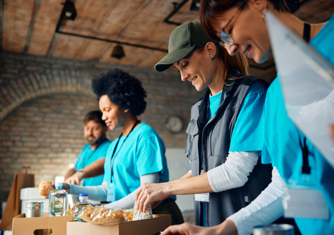 Food bank volunteers serving clients